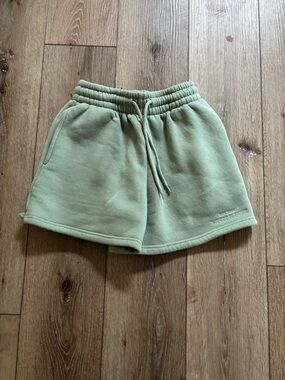 White Fox Boutique sweat shorts in a sage green color